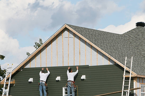 Professional Emergency Siding Repair technician working in Chincoteague Island, VA